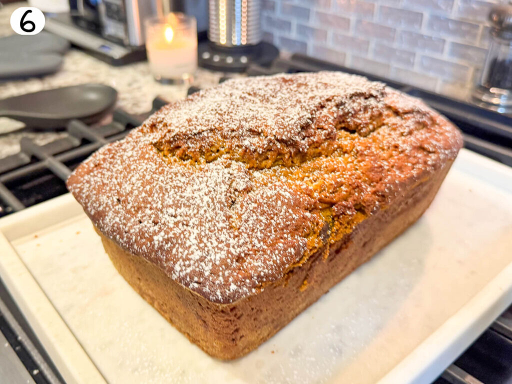 pumpkin bread fresh out of the oven on a marble tray