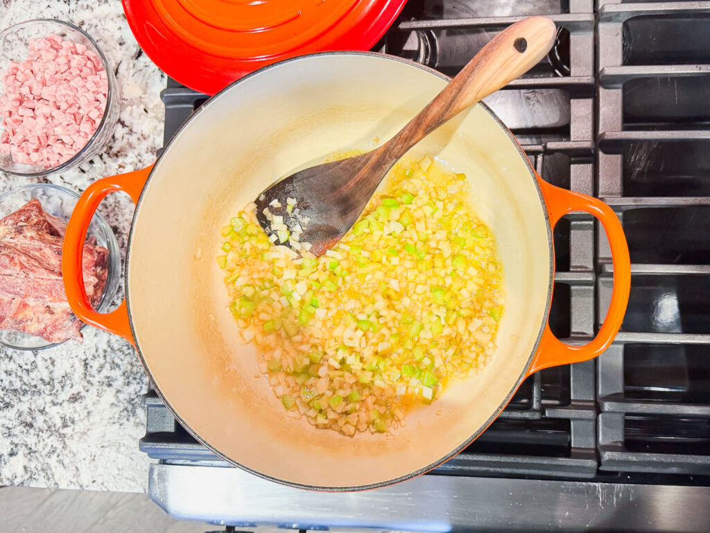 Photo of butter, onions and celery in a crockpot