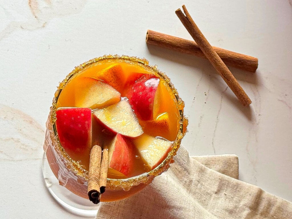 overhead shot of apple cider sangria in a glass