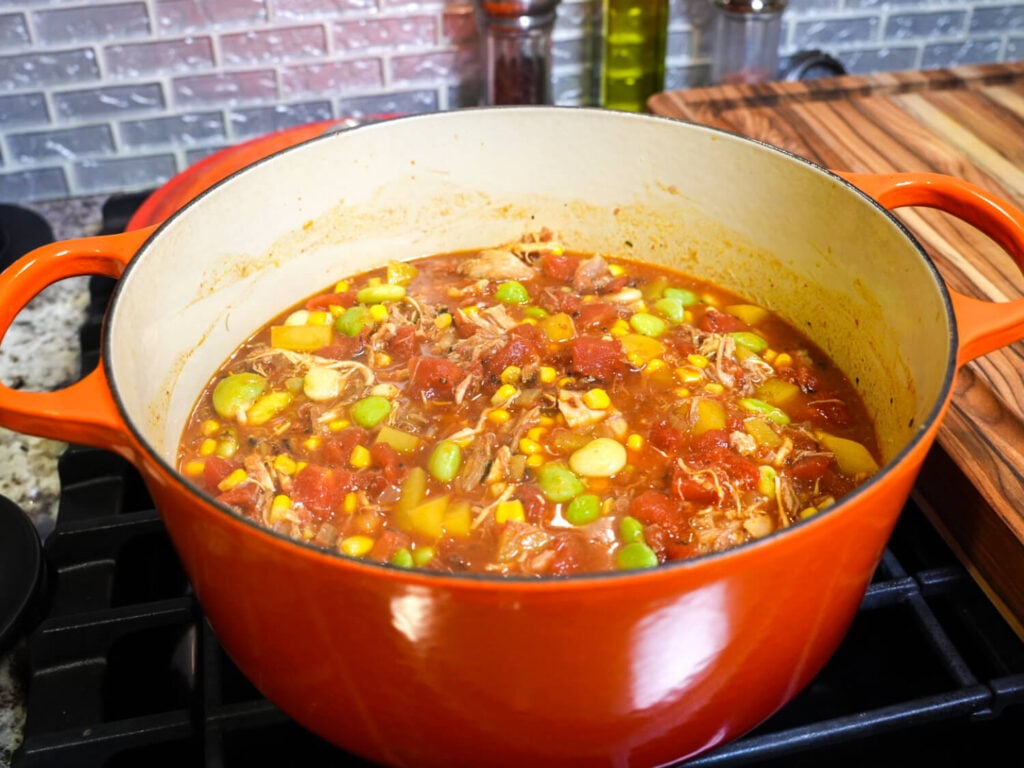 photo of Brunswick Stew in an orange dutch oven