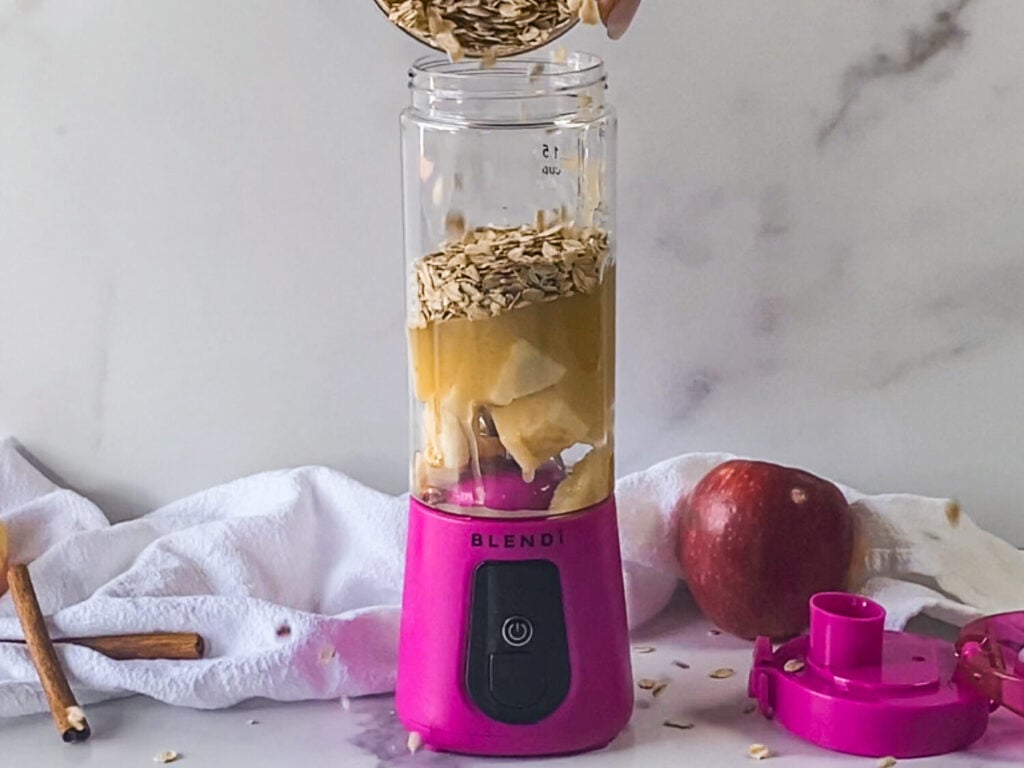 photo of adding oats to the blender