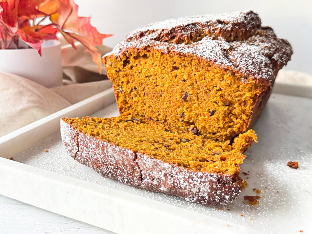 pumpkin bread with powdered sugar on top