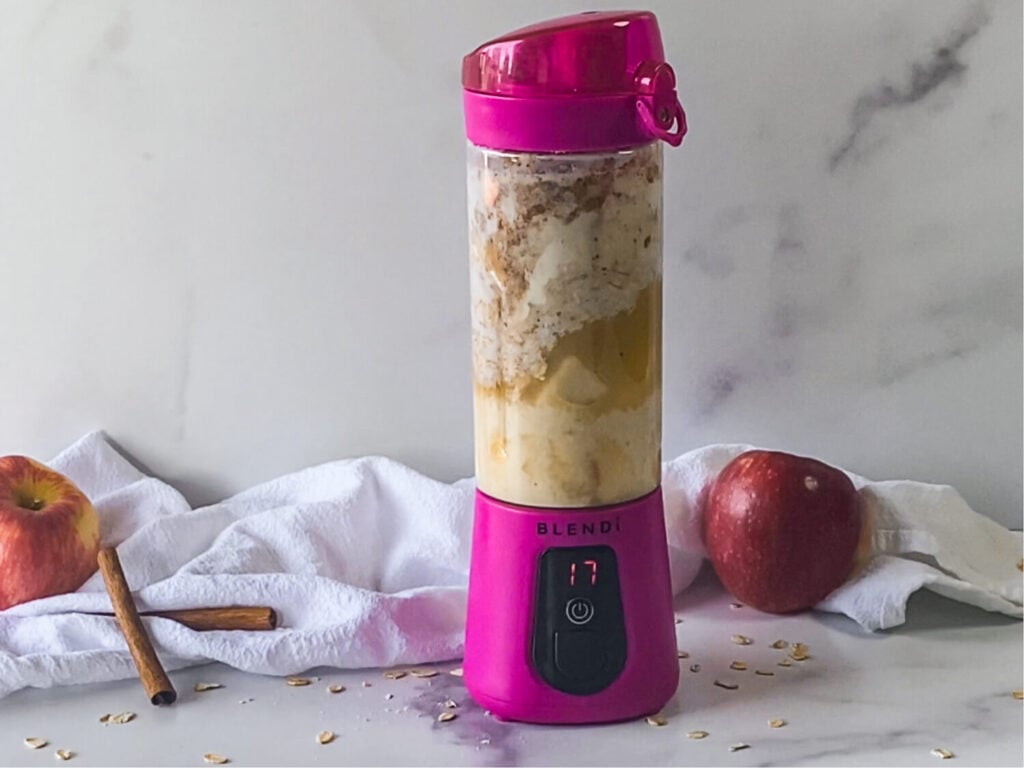 photo of apple smoothie ingredients being blended in the Blendi Pro+ Blender