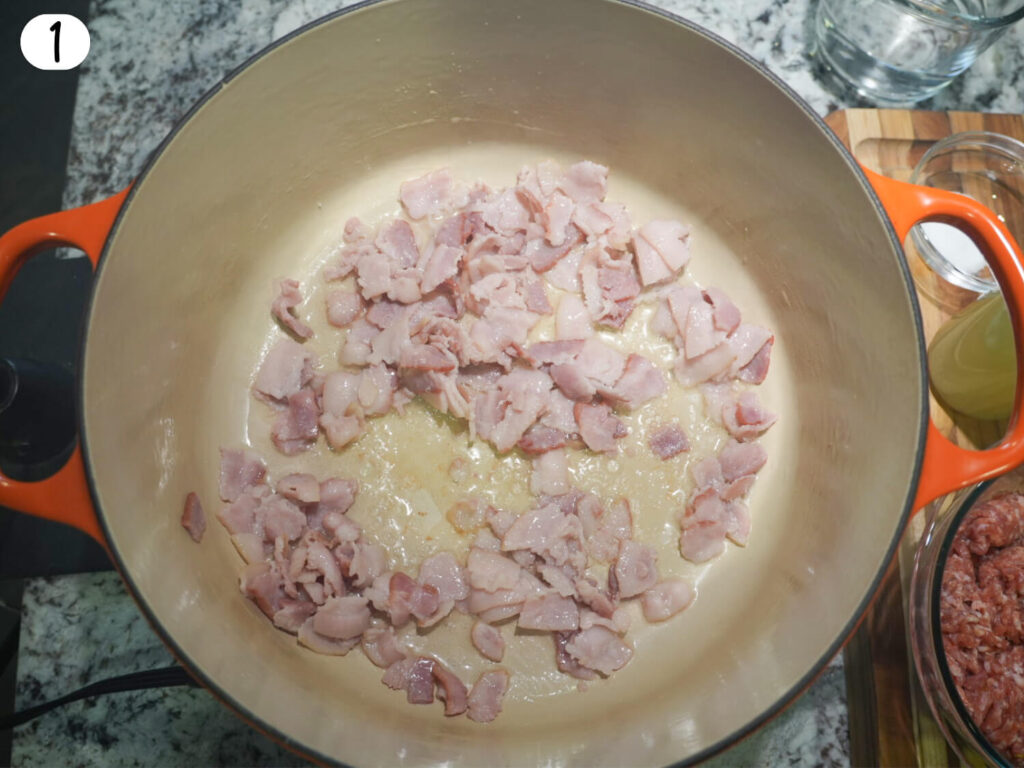 photo of bacon being saut&eacute;ed in a Dutch oven
