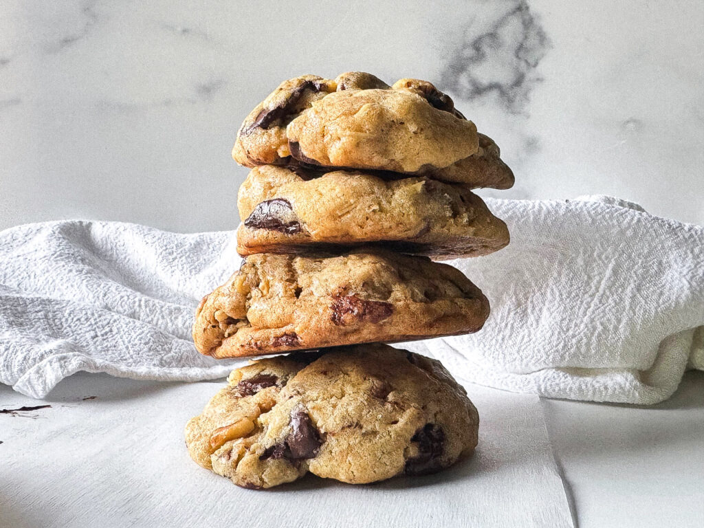 photo of four Oatmeal Chocolate Chip Cookies stacked on top of each other