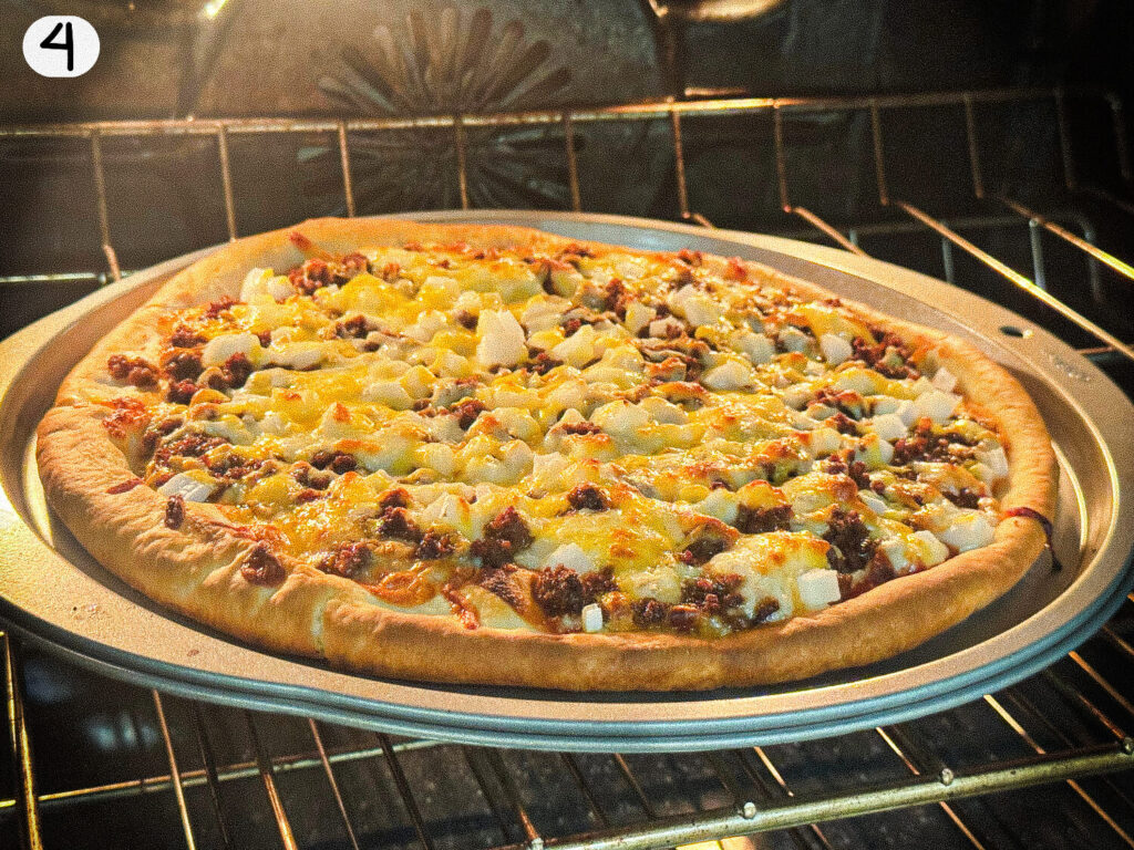 photo of taco pizza baking in the oven