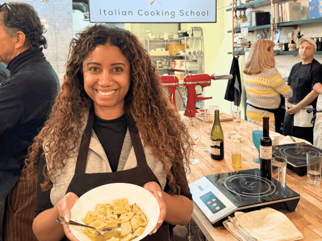 Photo of Ebony creator of Elicit Folio at an Italian Cooking School