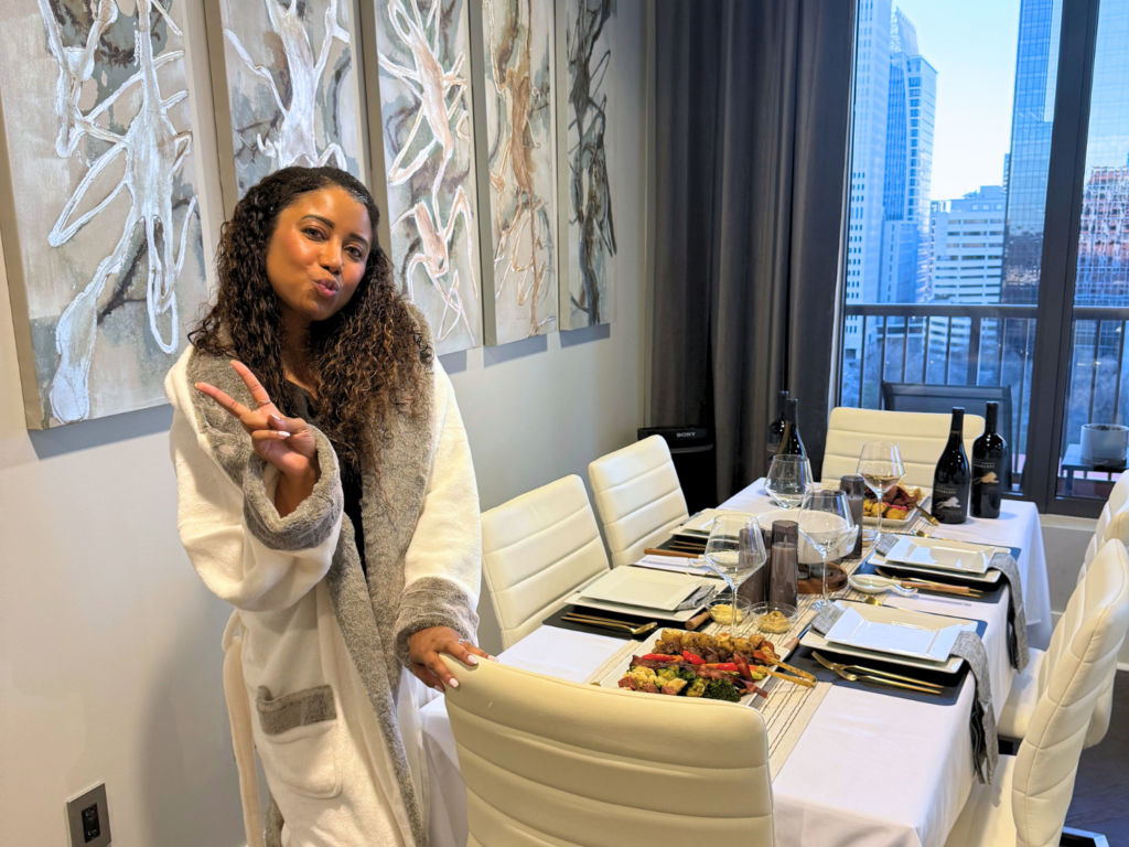 Photo of Elicit Folio at a hosting table with a cozy Robe on