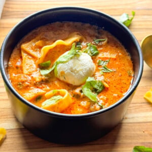 photo of lasagna soup in a black bowl