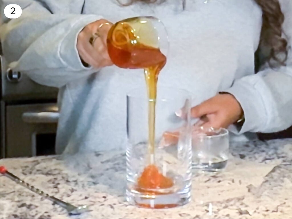 photo of pouring honey in a mixing jar