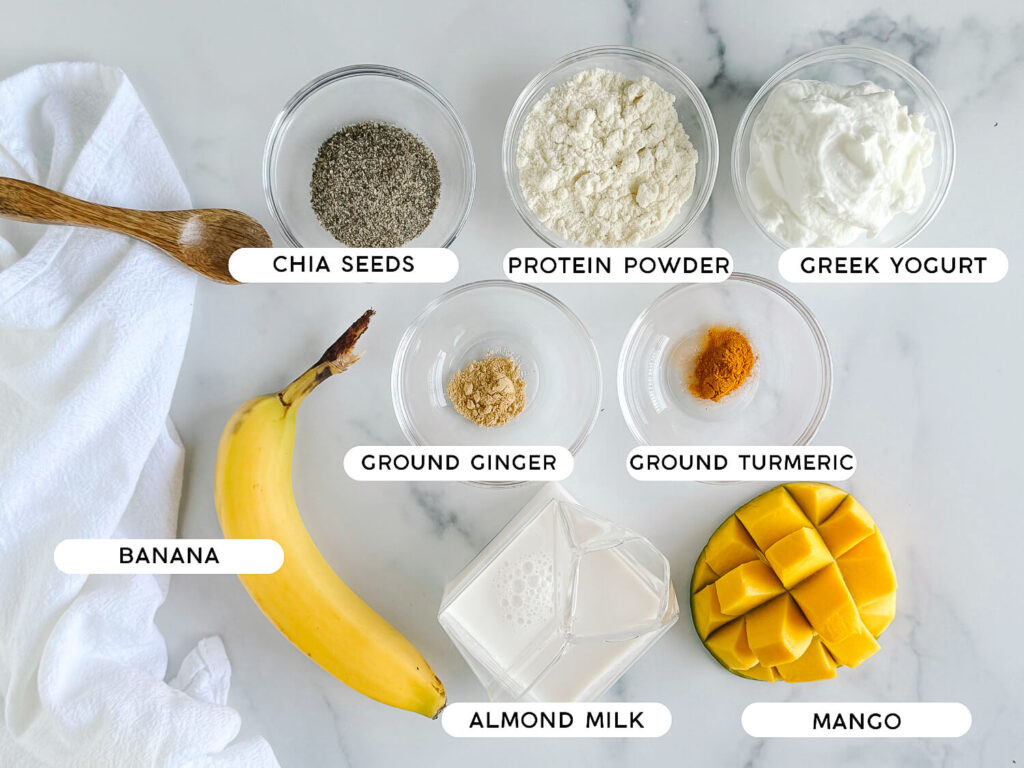 photo of all mango smoothie ingredients on a marble table