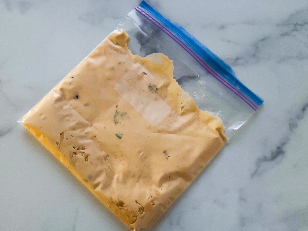 Photo of beer cheese in a freezer bag