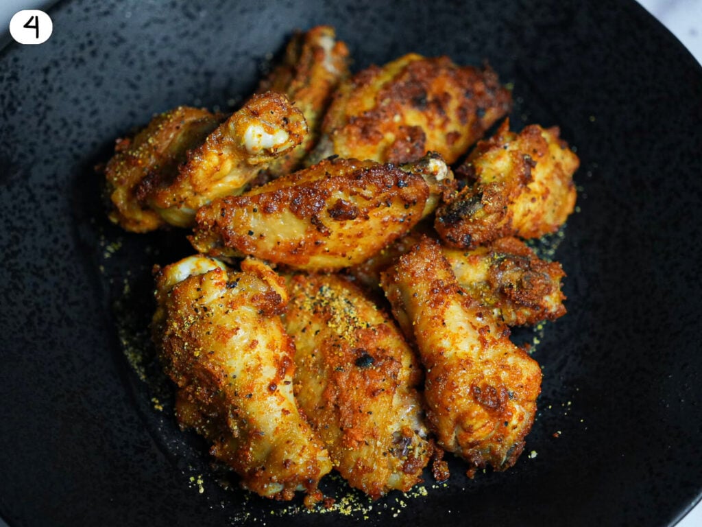 Step 4 Cooked Air Fryer Lemon Pepper Wings on a platter