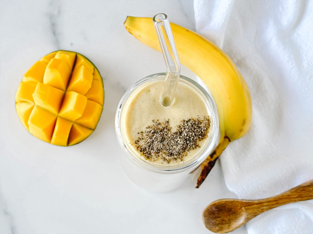 overhead photo of mango smoothie garnished with chia seeds