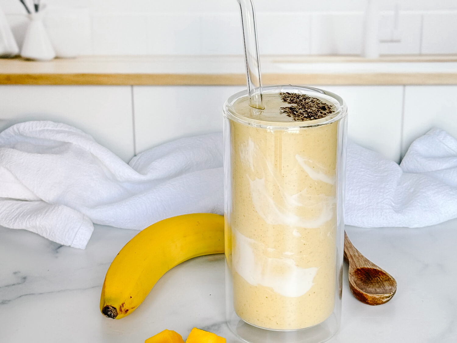 photo of a mango smoothie in a kitchen
