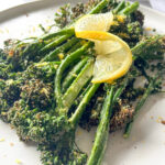 side view of air fryer Broccolini that's cooked