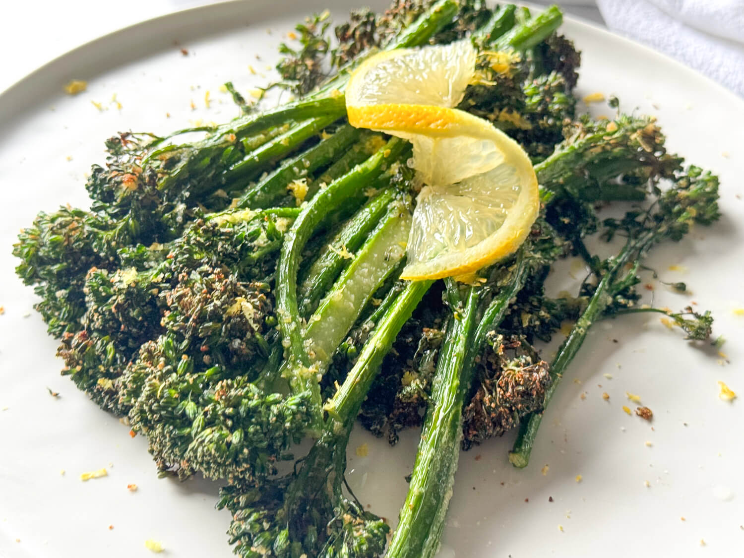 side view of air fryer Broccolini that's cooked