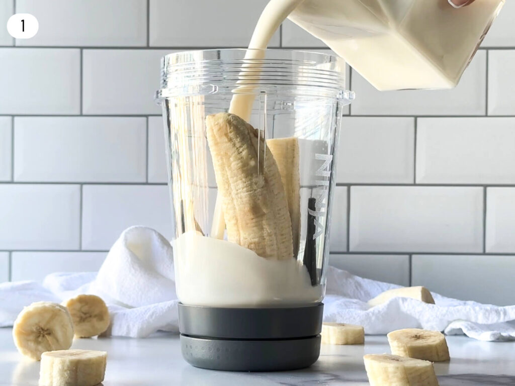 photo of almond milk being poured into a blender cup