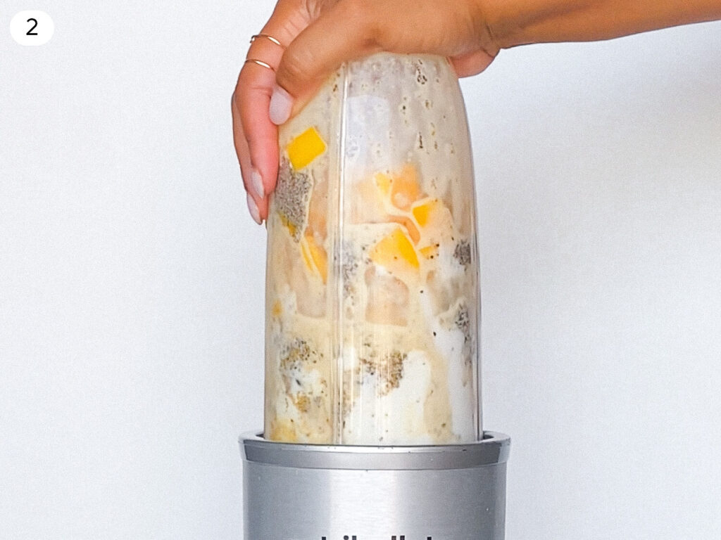 photo of a mango smoothie in a kitchen