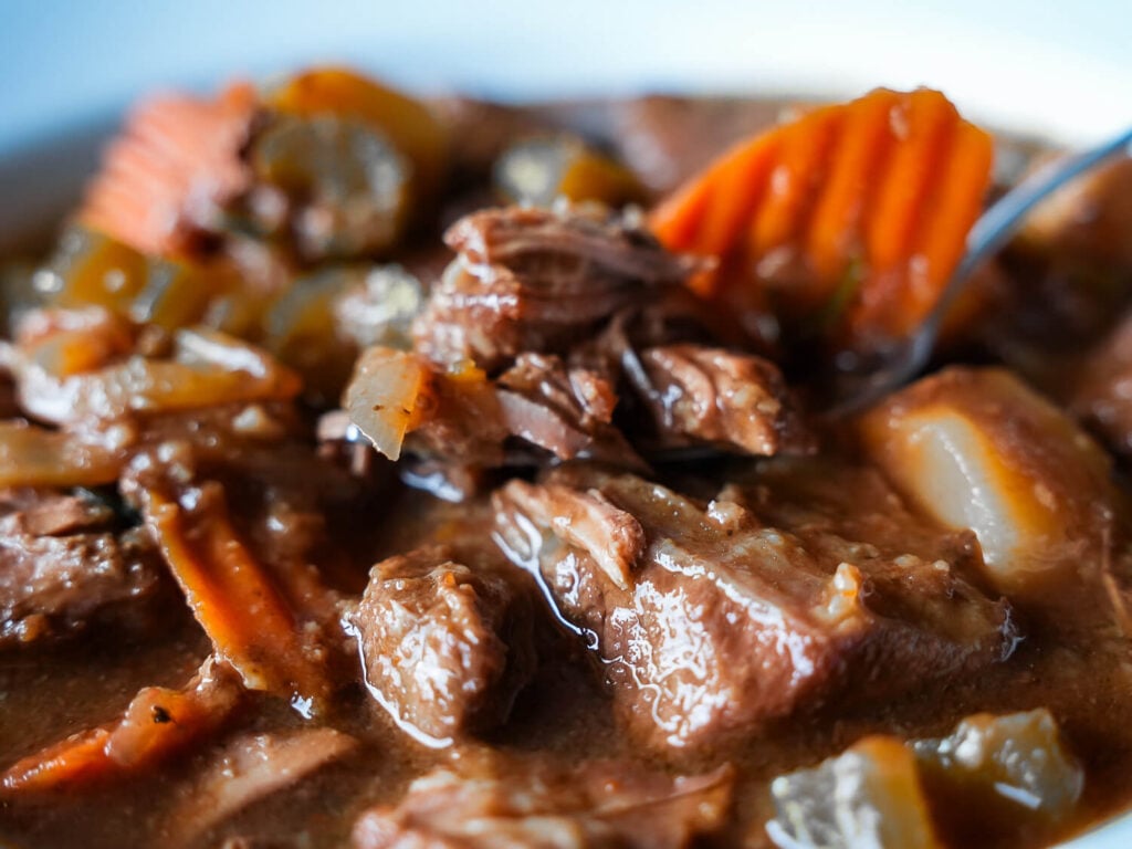 Slow Cooker Beef Stew in a fork