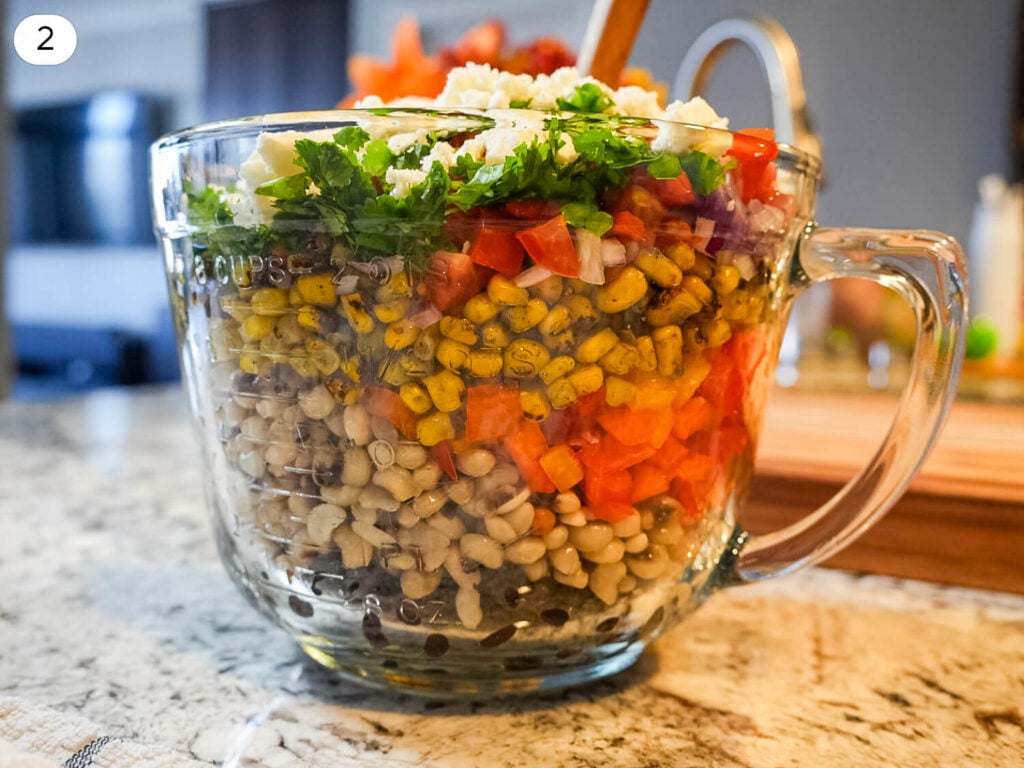 Step two photo showing all ingredients combined in a large bowl
