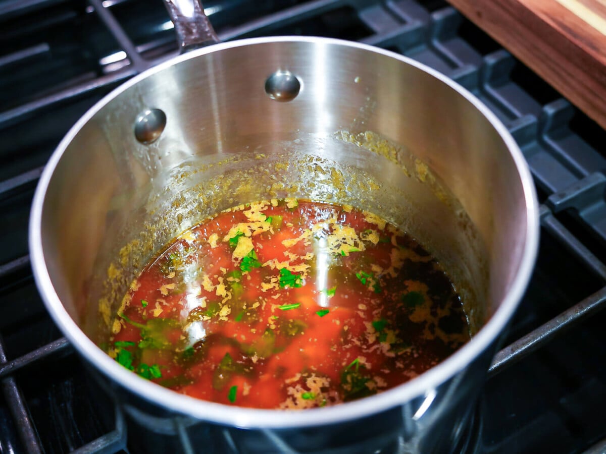 photo of Lemon Garlic Butter Sauce in a steel sauce pan