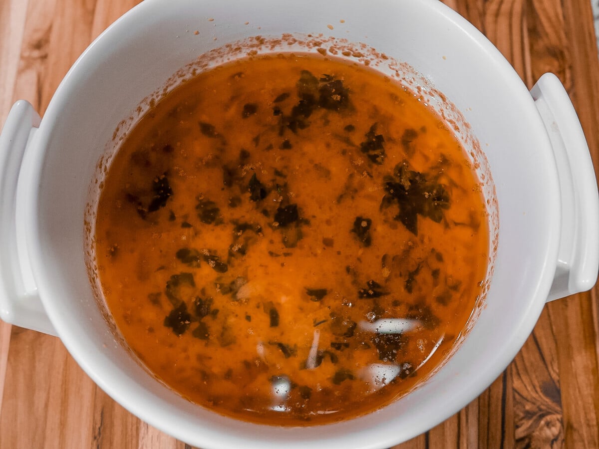 photo of Lemon Garlic Butter Sauce in a white fondue pot