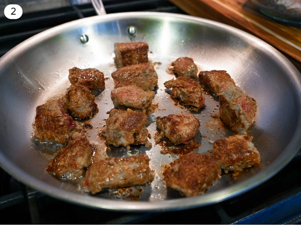 step 2 photo of browning beef meat in a pan