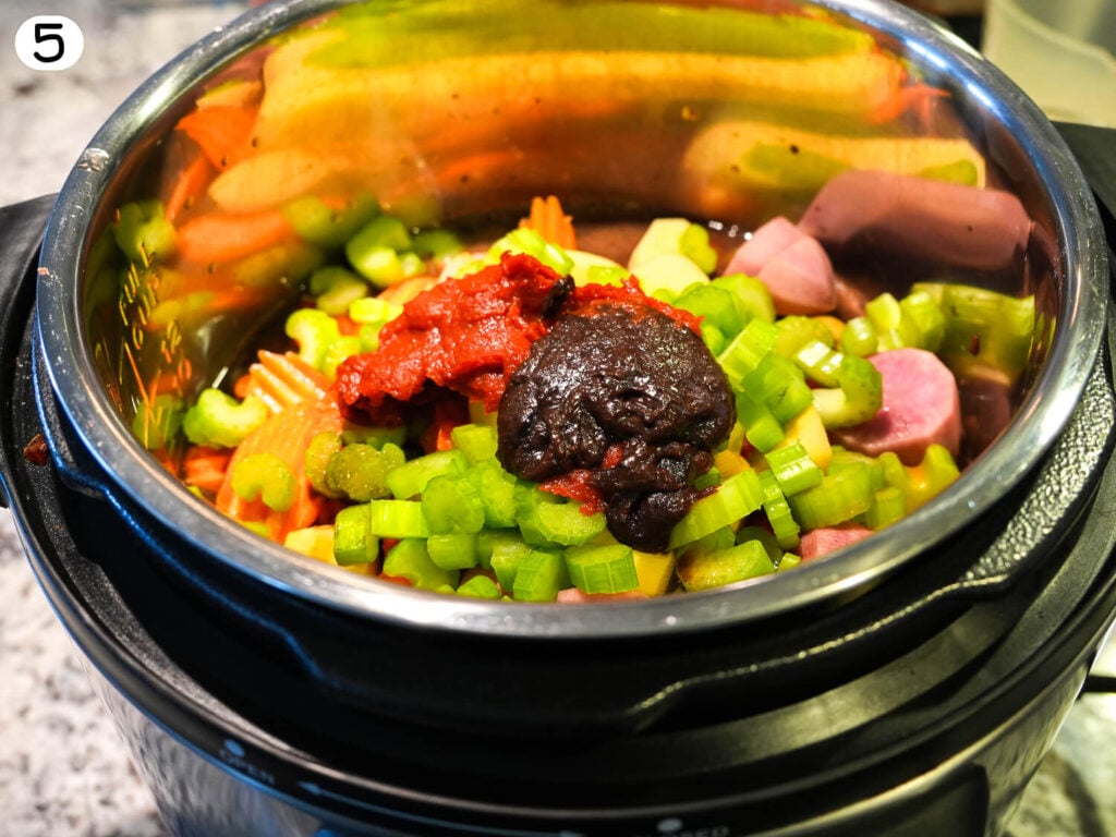 step five photo of adding all ingredients to the crock pot