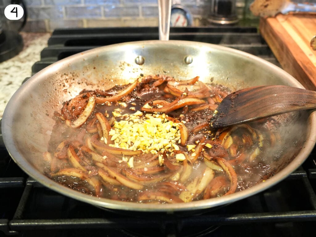step four photo of cooking onions and garlic in a pan
