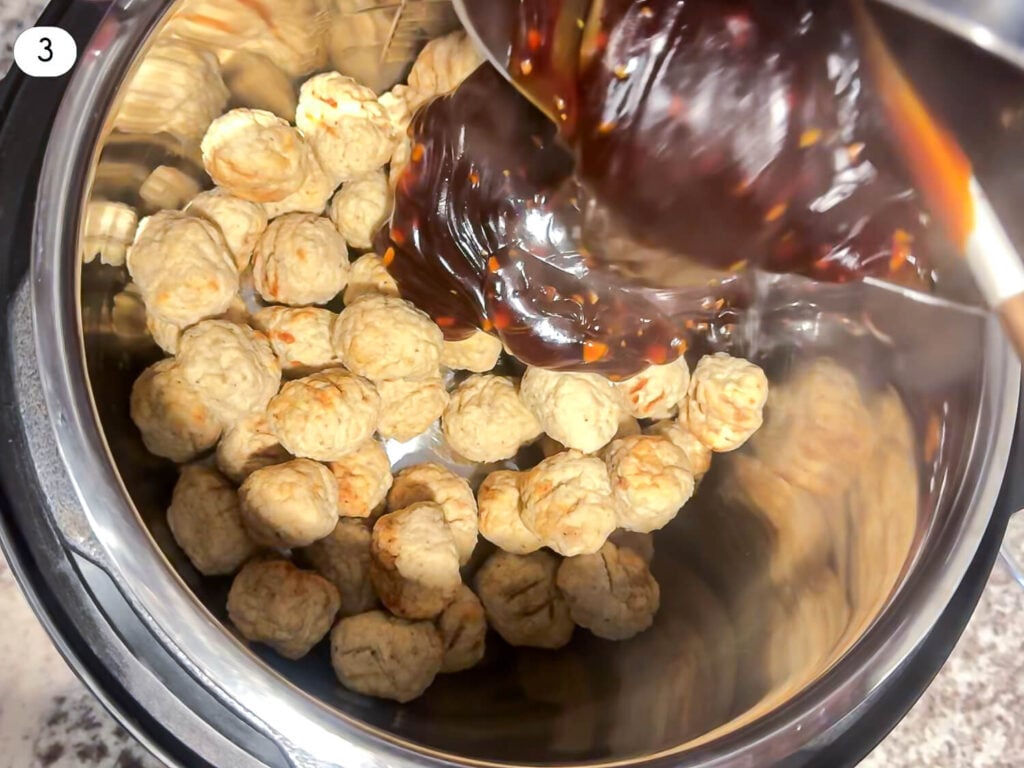 step three photo of Honey Garlic sauce being poured over frozen meatballs in a crockpot