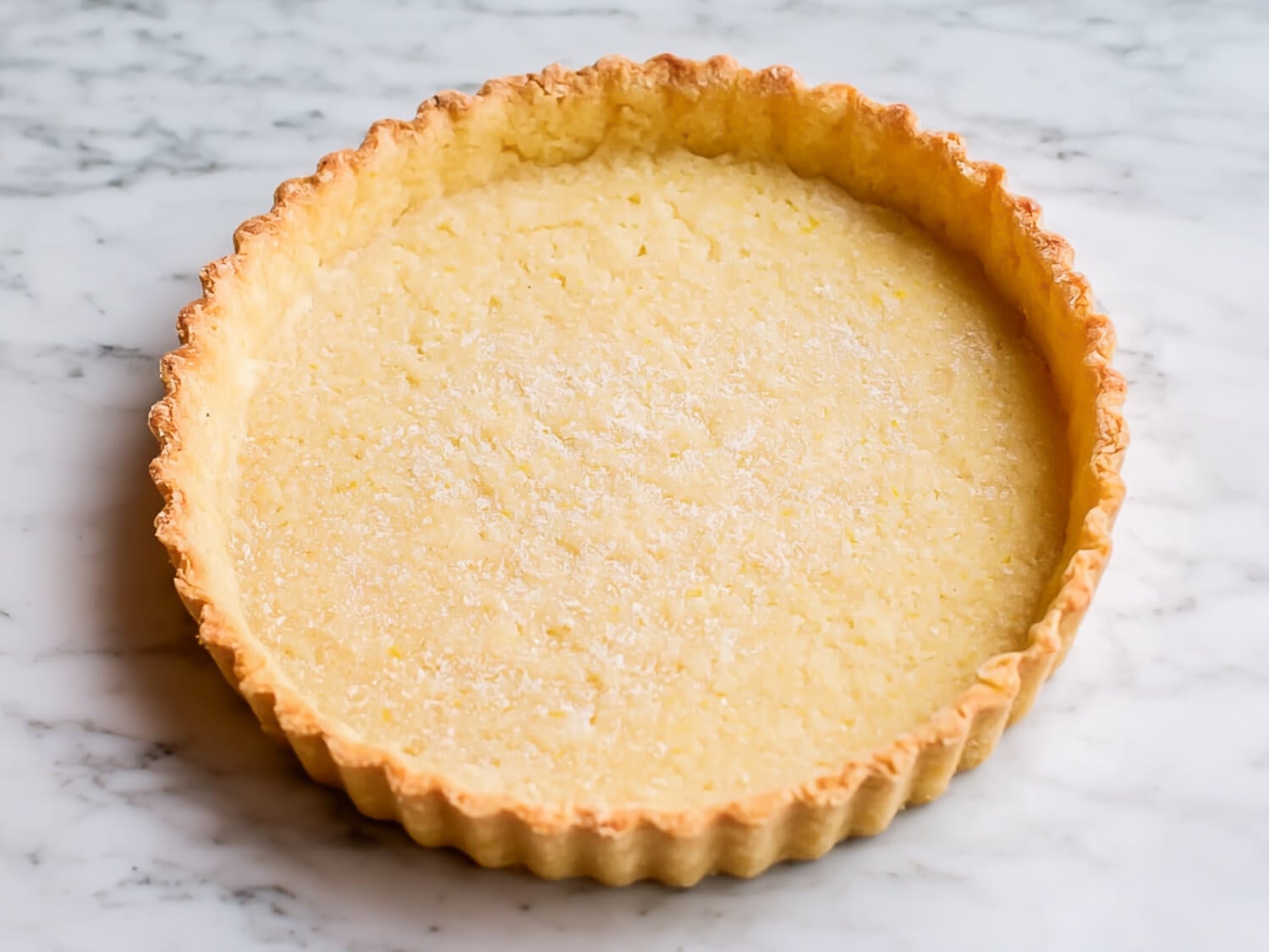 HERO photo of a large pâte sucree crust