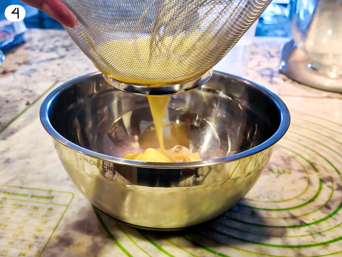 Step four photo of straining curd through strainer
