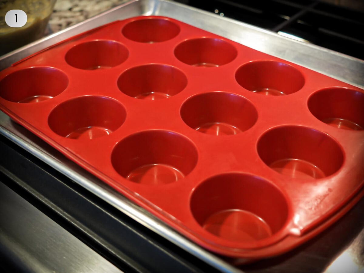 Step one photo of prepping muffin pan