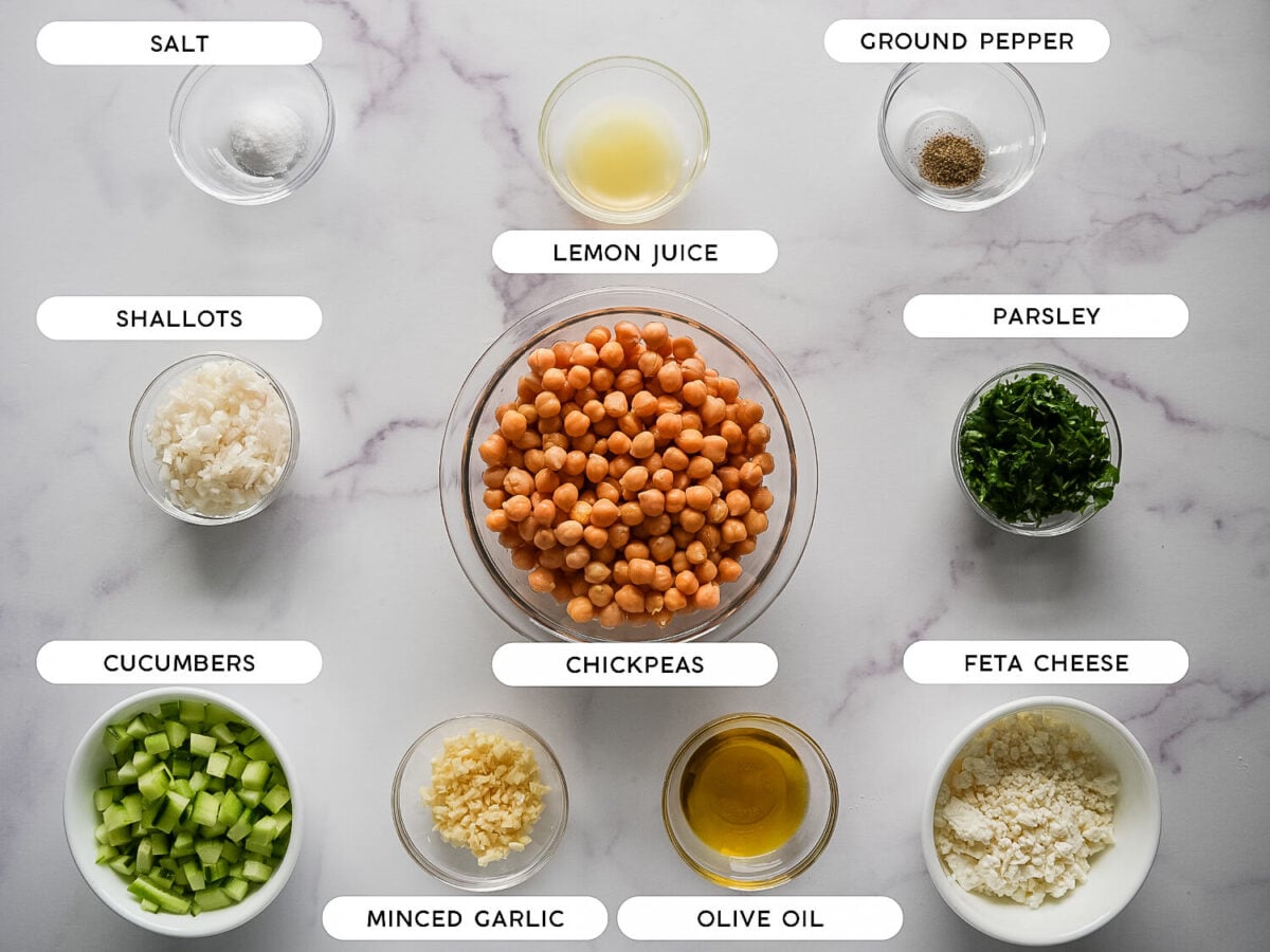 photo of Chickpea Cucumber Salad ingredients on a marble surface