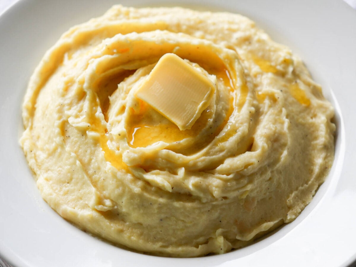 photo of Garlic Mashed Potatoes with a knob of butter on top