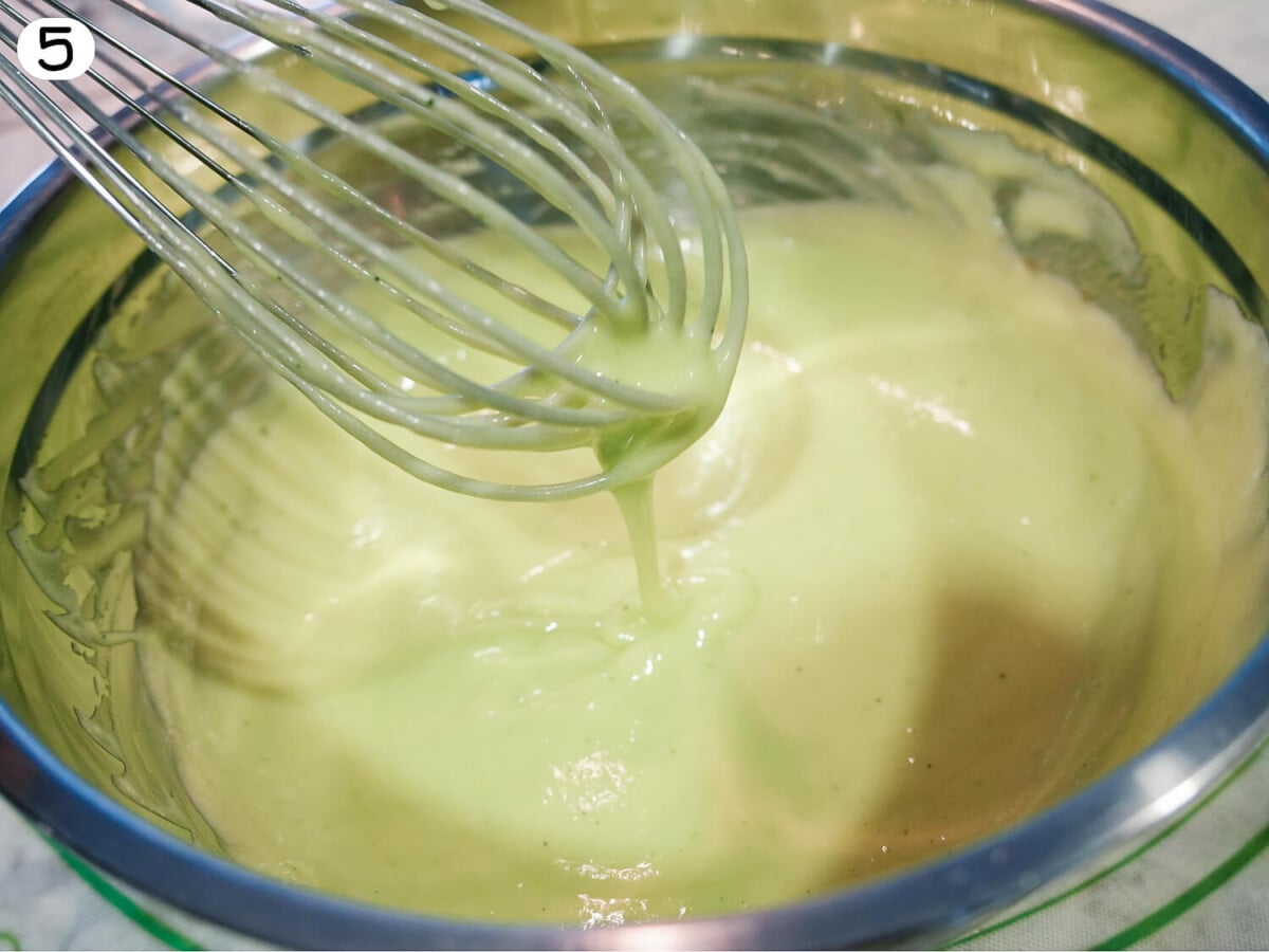 step 5 photo of lime curd in a metal bowl with a whisk