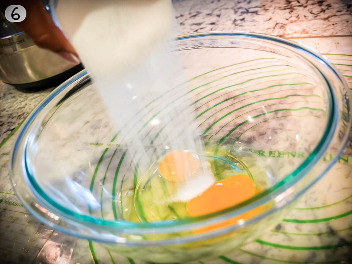 step 6 photo of mixing eggs and sugar together