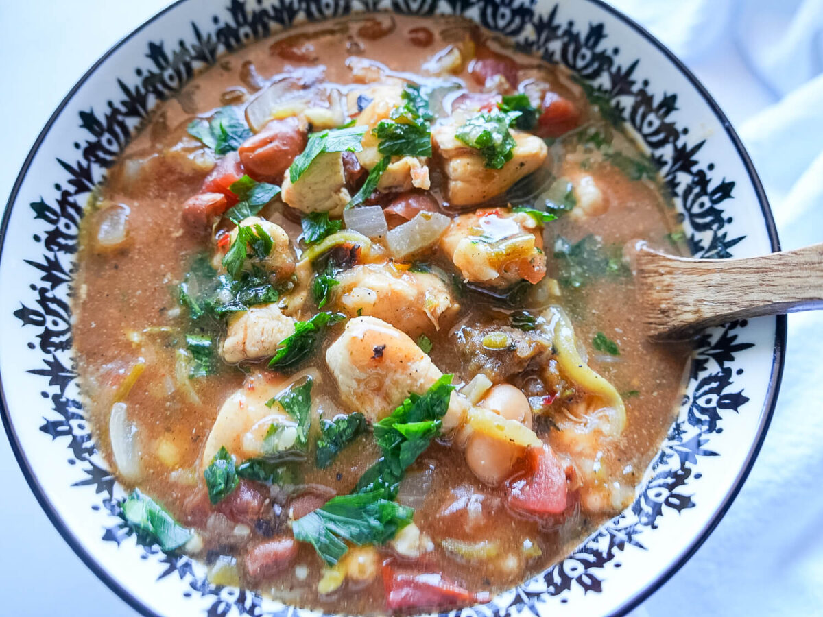 a photo of Chicken chili garnished with parsley