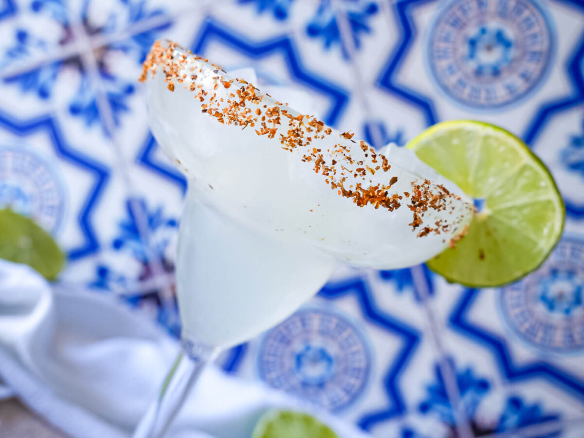 side photo of a Classic Margarita with a lime wheel
