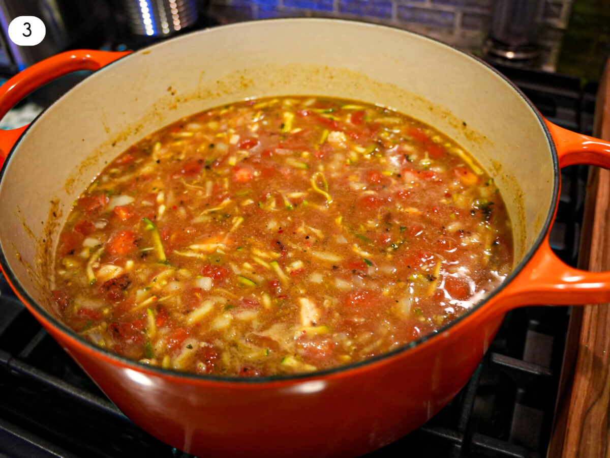 step three photo of adding beans to the dutch oven