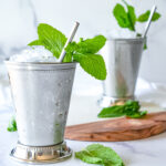 HERO photo of 2 Mint Juleps on a marble surface