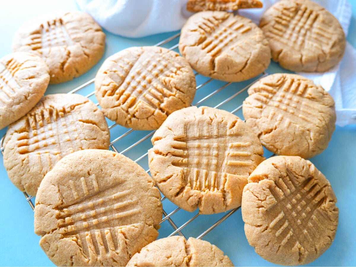 HERO photo of peanut butter cookie resting on a wire rack