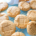 HERO photo of peanut butter cookie resting on a wire rack