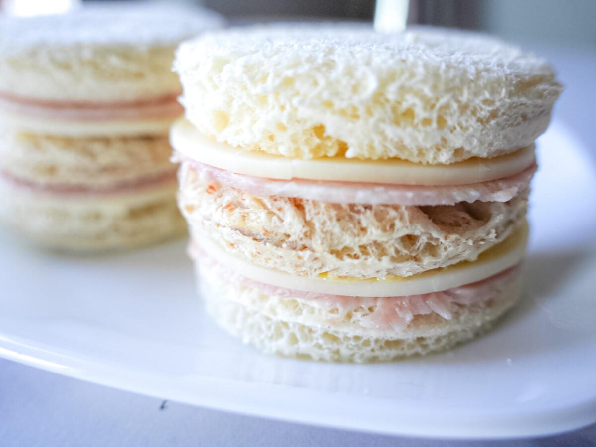 close up photo of a Ham & Cheese Tea Sandwich