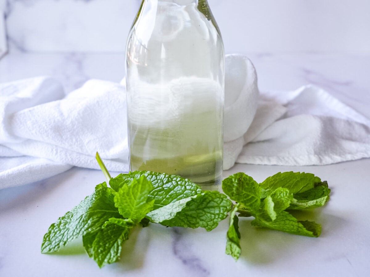 photo of mint simple syrup with mint leaves