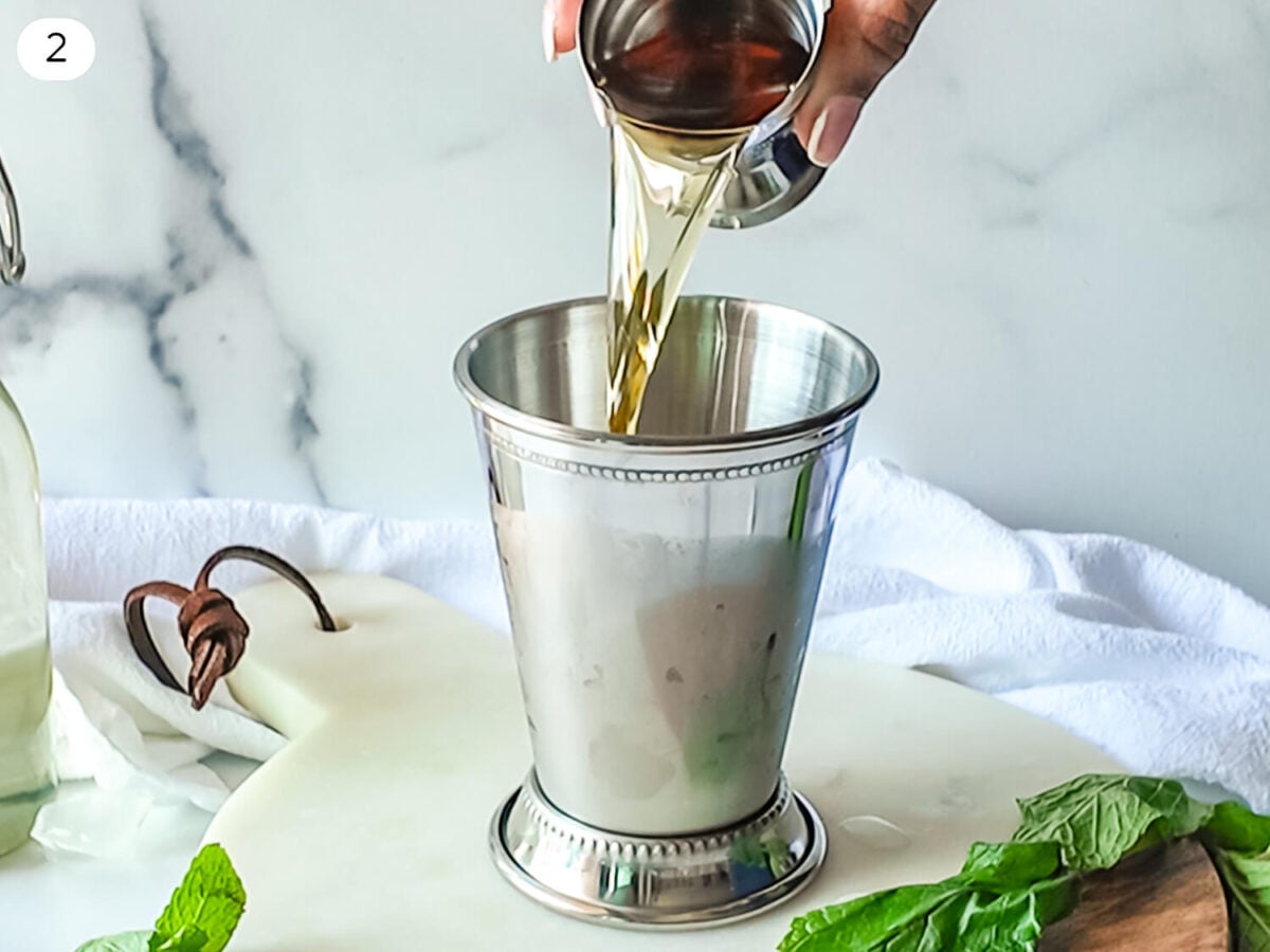 step 2 photo of adding bourbon