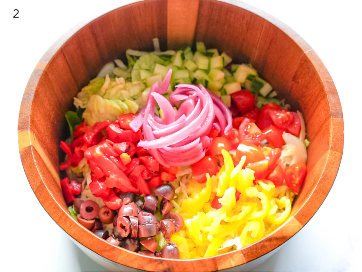 step 2 photo of chopped vegetables in a bowl prepared to make a salad