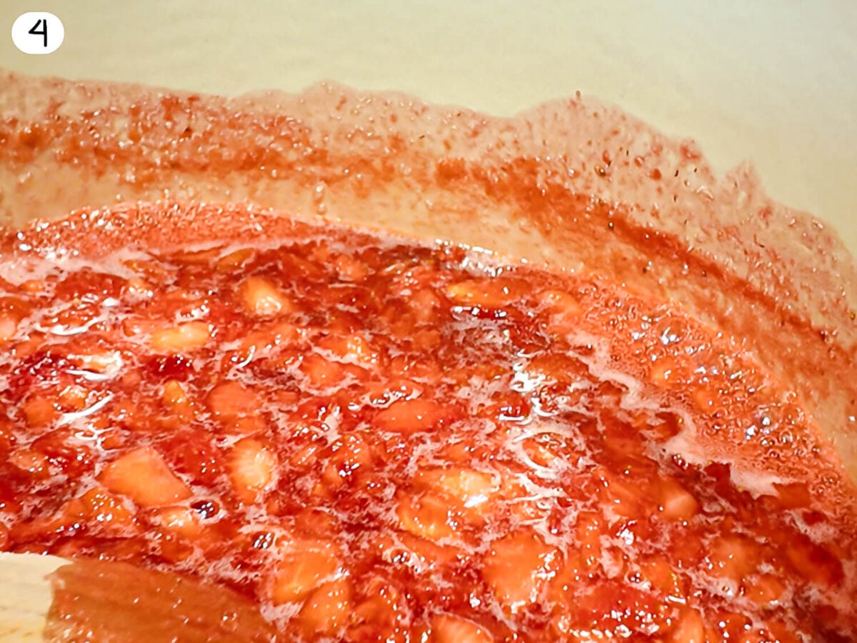 step 4 photo of jam coming to boil