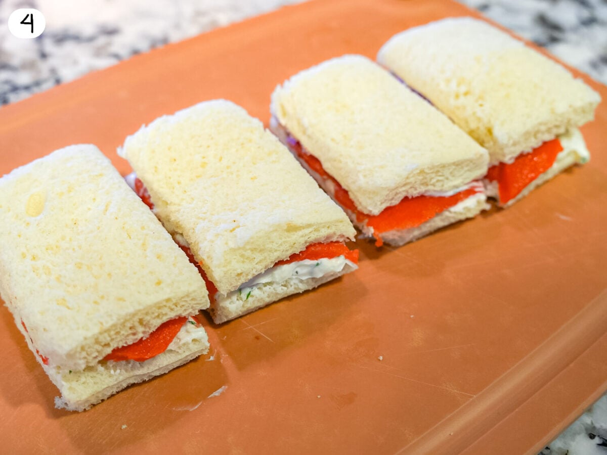 step 4 photo of sliced sandwiches on a cutting board